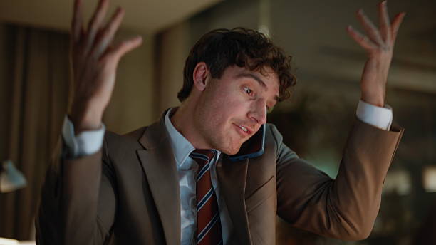 Businessman frustrated while handling marketing decisions alone